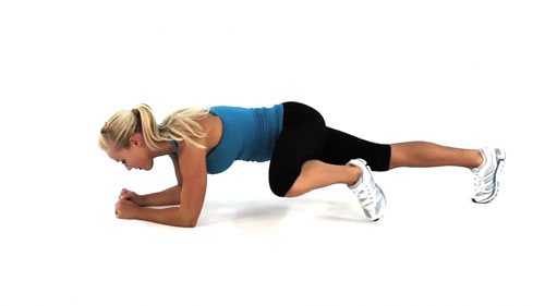 Plank with a knee twist is an excellent exercise to add to your faith and fitness program.