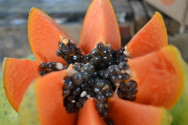 a papaya carved into a flower