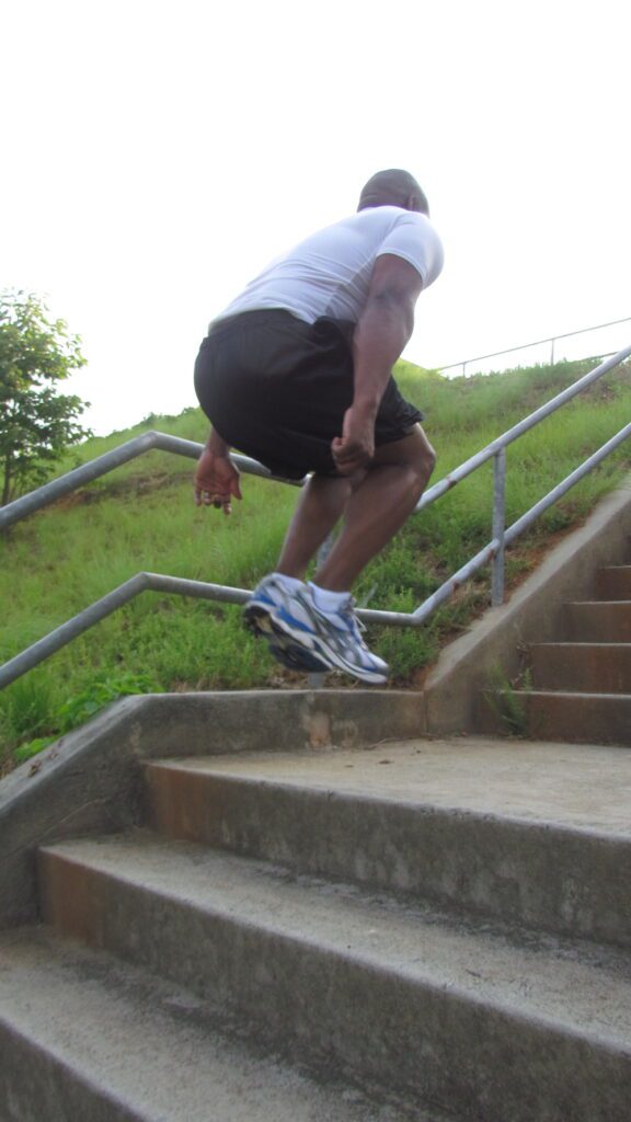 man exercising using stairs